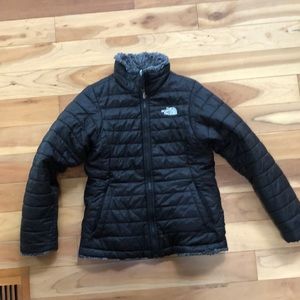 Girls reversible North Face jacket.